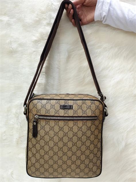 tas selempang pria original gucci|harga bag gucci pria.